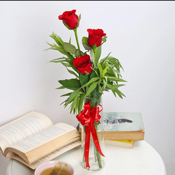 Red Roses In Glass Vase