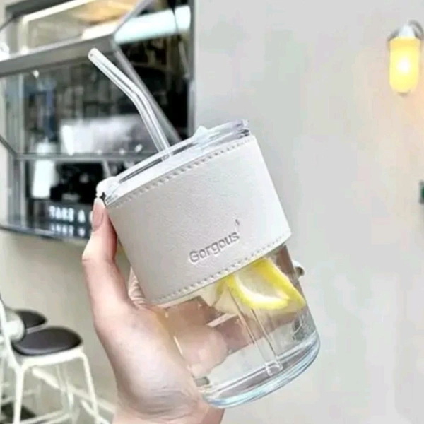 Trending Cute Luxury Transparent Glass Juice Or Coffee Cup With Straw And Leather Finish Holding Grip Support (450ml) 