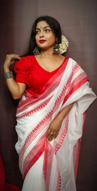 Raja & Nilima Traditional Temple Woven Border Saree