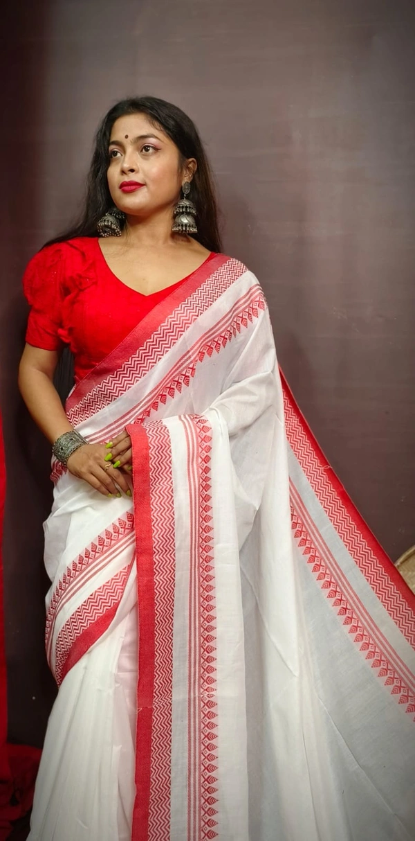 Raja & Nilima Traditional Temple Woven Border Saree