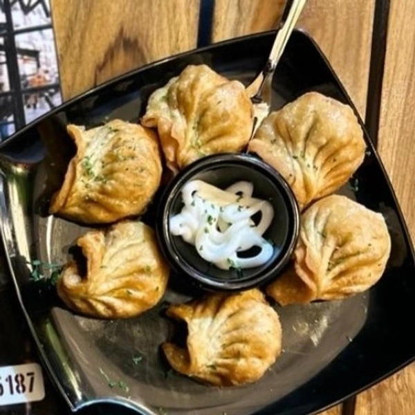 Veg Cheese Corn Momo Half