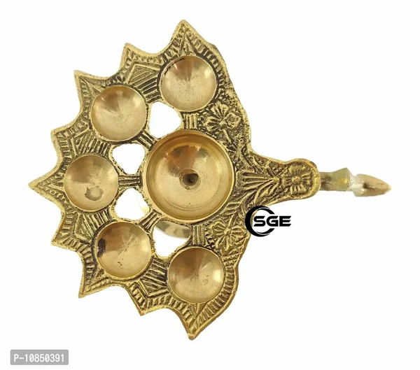 SHREE GANESH ENTERPRISES ? Diya Stand Lamp ? Lamp ? Diya Lamp ? Brass Diya Lamp ? Multi Wick Diya ? Auspicious Diya Lamp for Home Arti ? Praying Diya ? 6 Wick/Batti Lamp. ? Golden Diya LampSize: 12x16x7.5 (l x b x h) cms approxWithin 6-8 business days However, to find out an actual date of delivery, please enter your pin code.• Dimensions: 12X16X7.5 (L X B X H) Cms Approx 4.7x6.2x3
