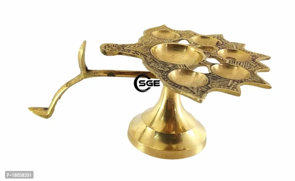 SHREE GANESH ENTERPRISES ? Diya Stand Lamp ? Lamp ? Diya Lamp ? Brass Diya Lamp ? Multi Wick Diya ? Auspicious Diya Lamp for Home Arti ? Praying Diya ? 6 Wick/Batti Lamp. ? Golden Diya LampSize: 12x16x7.5 (l x b x h) cms approxWithin 6-8 business days However, to find out an actual date of delivery, please enter your pin code.• Dimensions: 12X16X7.5 (L X B X H) Cms Approx 4.7x6.2x3