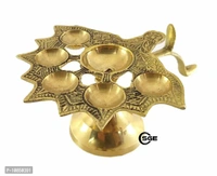 SHREE GANESH ENTERPRISES ? Diya Stand Lamp ? Lamp ? Diya Lamp ? Brass Diya Lamp ? Multi Wick Diya ? Auspicious Diya Lamp for Home Arti ? Praying Diya ? 6 Wick/Batti Lamp. ? Golden Diya LampSize: 12x16x7.5 (l x b x h) cms approxWithin 6-8 business days However, to find out an actual date of delivery, please enter your pin code.• Dimensions: 12X16X7.5 (L X B X H) Cms Approx 4.7x6.2x3