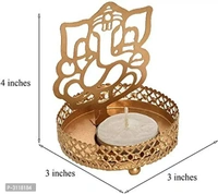 Shadow Ganesh ji  Tealight Candle HolderWithin 6-8 business days However, to find out an actual date of delivery, please enter your pin code.Material: Iron Color: Golden Vibrant and visually appealing, this Ganesh Ji candle tea light holder from the storehouse collection of Heaven Decor exhibits great artisanship. Heaven Decor, a well known brand is known to provide wide range of d