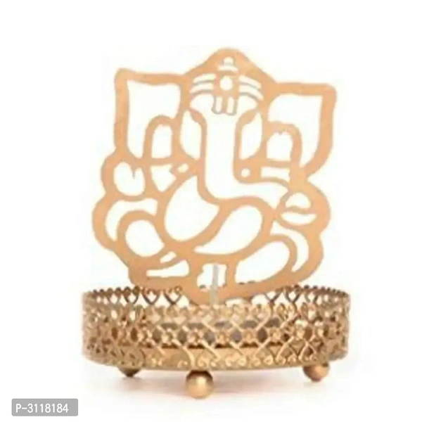 Shadow Ganesh ji  Tealight Candle HolderWithin 6-8 business days However, to find out an actual date of delivery, please enter your pin code.Material: Iron Color: Golden Vibrant and visually appealing, this Ganesh Ji candle tea light holder from the storehouse collection of Heaven Decor exhibits great artisanship. Heaven Decor, a well known brand is known to provide wide range of d