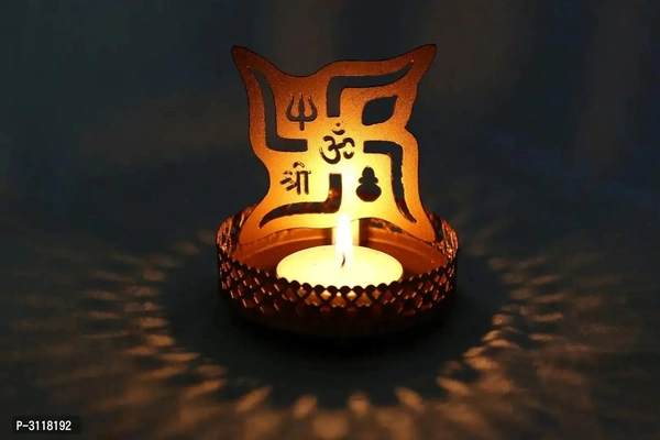 Swastik Shadow Tealight Candle HolderWithin 6-8 business days However, to find out an actual date of delivery, please enter your pin code.Material: Iron Color: Golden Exquisite Tea Light Candle Holder, just enlighten the candle place the concept near wall adjust distance . Wow! The enlarged shadow formed on back side is spellbonding.