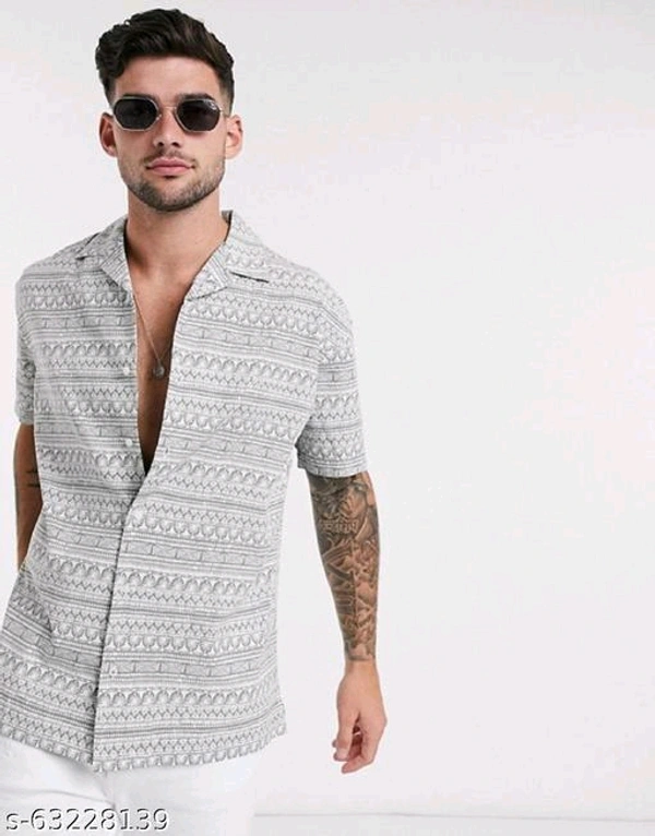 Pretty Glamorous Men Shirts*Fabric: RayonSleeve Length: Short SleevesPattern: Product DependentNet Quantity (N): 1Sizes:S (Chest Size: 36 in, Length Size: 28.5 in) M (Chest Size: 38 in, Length Size: 29 in) L (Chest Size: 40 in, Length Size: 29.5 in) XL (Chest Size: 42 in, Length Size: 30 in) XXL (Chest Size: 44 in, Length Size: 30.5 in) Dispatch: 1 Day*Proof of Safe D