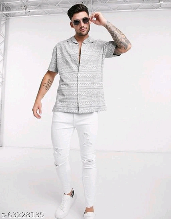Pretty Glamorous Men Shirts*Fabric: RayonSleeve Length: Short SleevesPattern: Product DependentNet Quantity (N): 1Sizes:S (Chest Size: 36 in, Length Size: 28.5 in) M (Chest Size: 38 in, Length Size: 29 in) L (Chest Size: 40 in, Length Size: 29.5 in) XL (Chest Size: 42 in, Length Size: 30 in) XXL (Chest Size: 44 in, Length Size: 30.5 in) Dispatch: 1 Day*Proof of Safe D