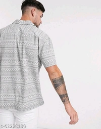 Pretty Glamorous Men Shirts*Fabric: RayonSleeve Length: Short SleevesPattern: Product DependentNet Quantity (N): 1Sizes:S (Chest Size: 36 in, Length Size: 28.5 in) M (Chest Size: 38 in, Length Size: 29 in) L (Chest Size: 40 in, Length Size: 29.5 in) XL (Chest Size: 42 in, Length Size: 30 in) XXL (Chest Size: 44 in, Length Size: 30.5 in) Dispatch: 1 Day*Proof of Safe D