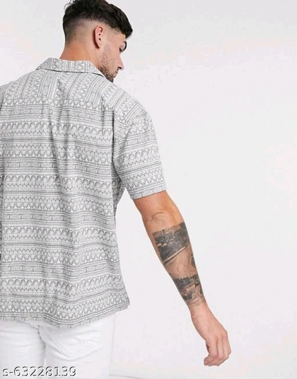 Pretty Glamorous Men Shirts*Fabric: RayonSleeve Length: Short SleevesPattern: Product DependentNet Quantity (N): 1Sizes:S (Chest Size: 36 in, Length Size: 28.5 in) M (Chest Size: 38 in, Length Size: 29 in) L (Chest Size: 40 in, Length Size: 29.5 in) XL (Chest Size: 42 in, Length Size: 30 in) XXL (Chest Size: 44 in, Length Size: 30.5 in) Dispatch: 1 Day*Proof of Safe D