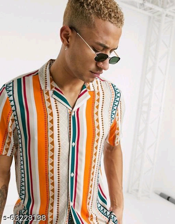 Pretty Glamorous Men Shirts*Fabric: RayonSleeve Length: Short SleevesPattern: Product DependentNet Quantity (N): 1Sizes:S (Chest Size: 36 in, Length Size: 28.5 in) M (Chest Size: 38 in, Length Size: 29 in) L (Chest Size: 40 in, Length Size: 29.5 in) XL (Chest Size: 42 in, Length Size: 30 in) XXL (Chest Size: 44 in, Length Size: 30.5 in) Dispatch: 1 Day*Proof of Safe D