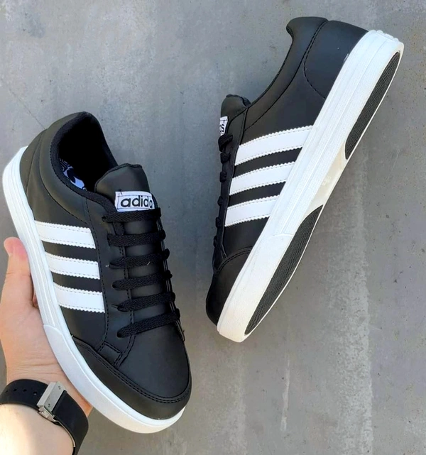 Adidas  Step Out in Style with Our Classic White Sneakers - 11, Black
