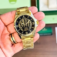 Classic style meets superp functional ;the iconic fluting found on many Rolex classic watches. Have a look on this timepiece - Gold