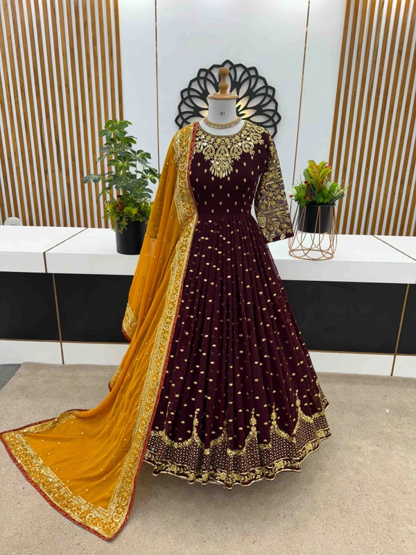 Goswami Traders  Launching New Designer Party Wear Gown  - Nutmeg Wood Finish