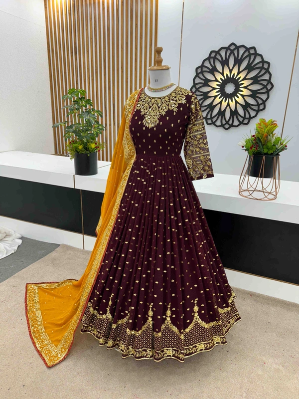 Goswami Traders  Launching New Designer Party Wear Gown  - Nutmeg Wood Finish