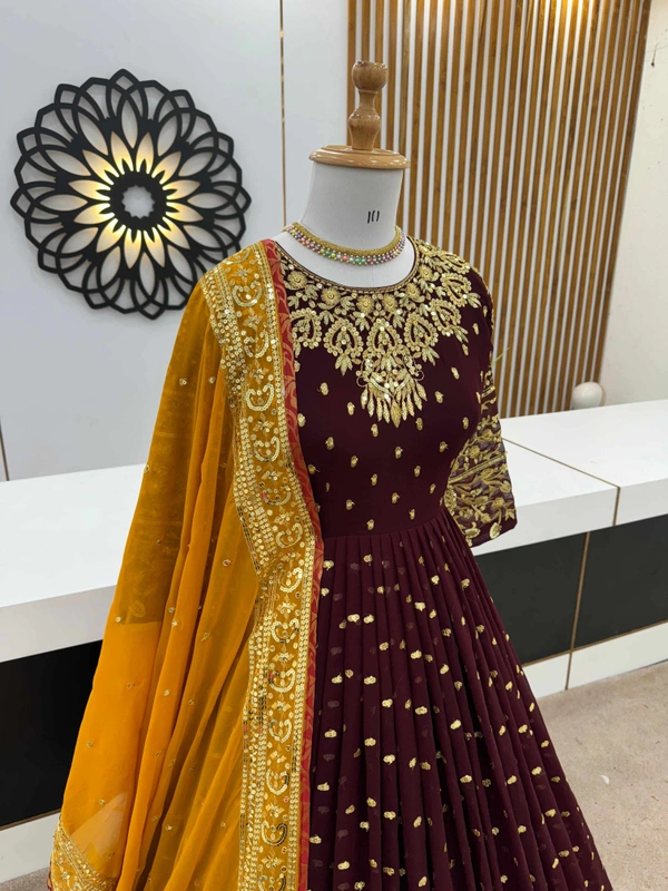 Goswami Traders  Launching New Designer Party Wear Gown  - Nutmeg Wood Finish