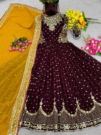 Goswami Traders  Launching New Designer Party Wear Gown  - Nutmeg Wood Finish