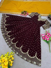 Goswami Traders  Launching New Designer Party Wear Gown  - Nutmeg Wood Finish