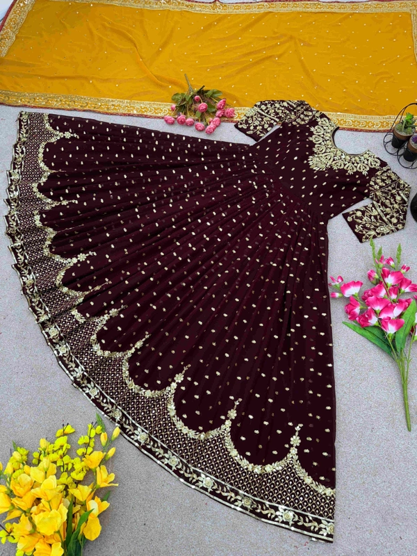 Goswami Traders  Launching New Designer Party Wear Gown  - Nutmeg Wood Finish