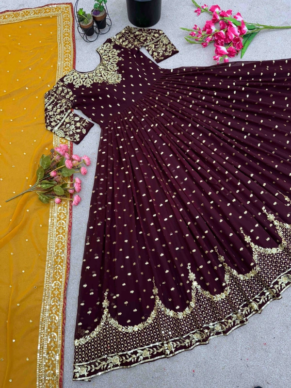 Goswami Traders  Launching New Designer Party Wear Gown  - Nutmeg Wood Finish