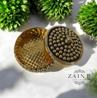 Sold By ZAIN R CREATION A Sindoor or Kumkum pot is a traditional container used to store sacred red powder - L.2.75'' H.1.57'', Brass