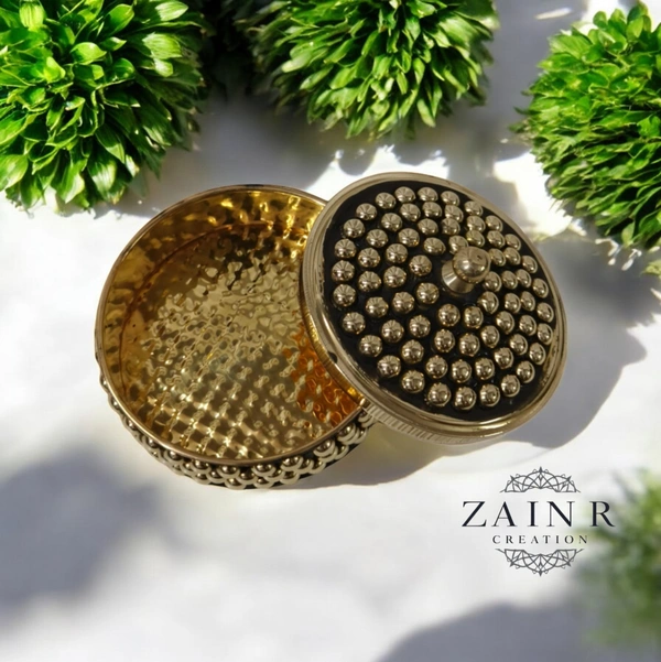 Sold By ZAIN R CREATION A Sindoor or Kumkum pot is a traditional container used to store sacred red powder - L.2.75'' H.1.57'', Brass