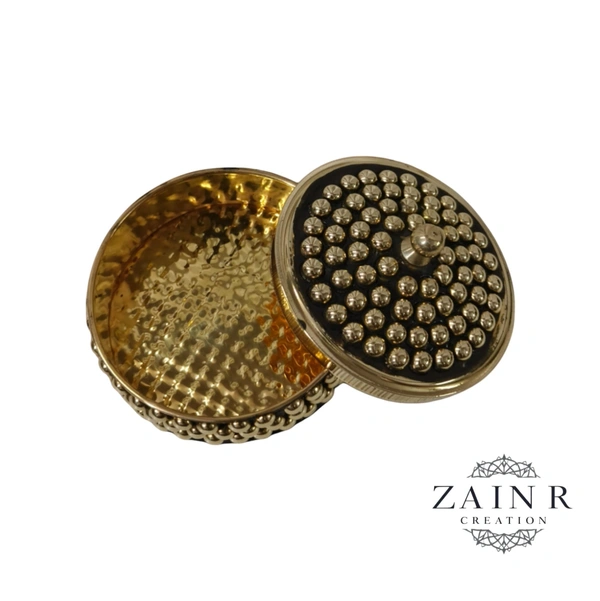 Sold By ZAIN R CREATION A Sindoor or Kumkum pot is a traditional container used to store sacred red powder - L.2.75'' H.1.57'', Brass