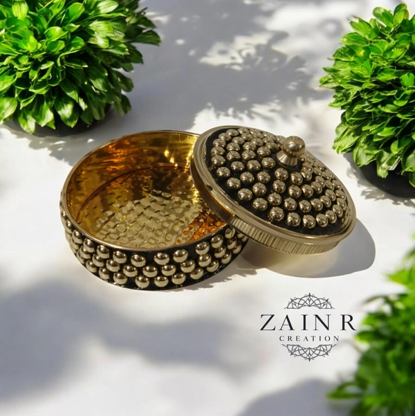 Sold By ZAIN R CREATION A Sindoor or Kumkum pot is a traditional container used to store sacred red powder - L.2.75'' H.1.57'', Brass