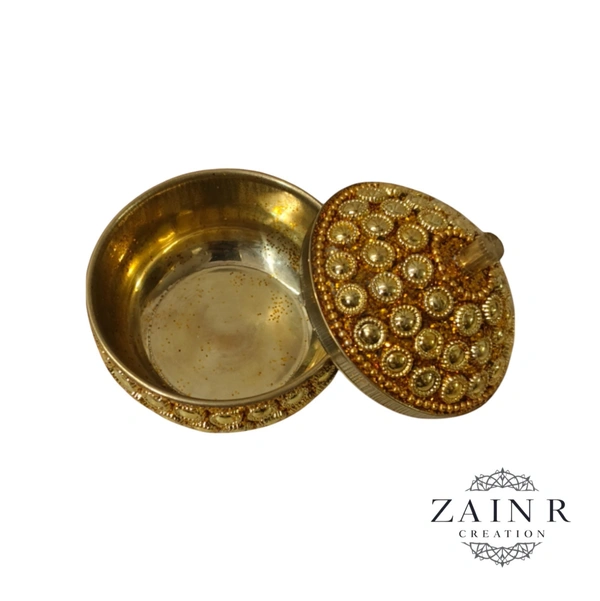Sold By ZAIN R CREATION A Sindoor or Kumkum pot is a traditional container used to store sacred red powder - H.2'' B.2'', Brass