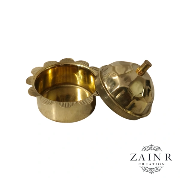 Sold By ZAIN R CREATION A Sindoor or Kumkum pot is a traditional container used to store sacred red powder - H.2'' B.2'', Brass