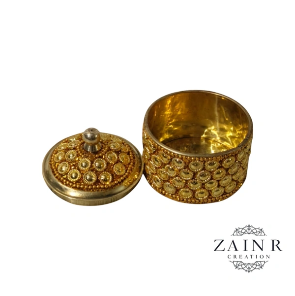 Sold By ZAIN R CREATION A Sindoor or Kumkum pot is a traditional container used to store sacred red powder - H.2'' B.2'', Brass