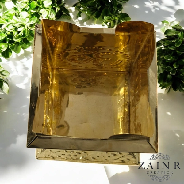 Sold By ZAIN R CREATION A Brass Tulsi Pot, also known as a Tulsi Kyara or Tulsi Maadam - H.7.5'' L.4'' B.5.5'', Brass