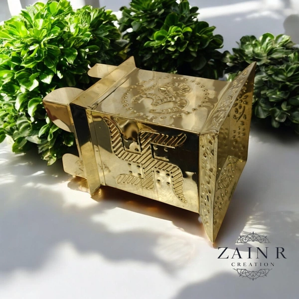 Sold By ZAIN R CREATION A Brass Tulsi Pot, also known as a Tulsi Kyara or Tulsi Maadam - H.7.5'' L.4'' B.5.5'', Brass