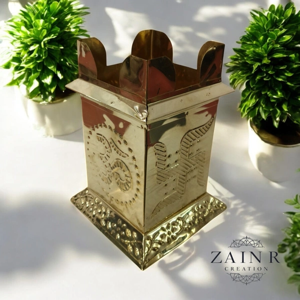 Sold By ZAIN R CREATION A Brass Tulsi Pot, also known as a Tulsi Kyara or Tulsi Maadam - H.7.5'' L.4'' B.5.5'', Brass