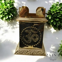 Sold By ZAIN R CREATION A Brass Tulsi Pot, also known as a Tulsi Kyara or Tulsi Maadam - H.7.5'' L.4'' B.5.5'', Brass