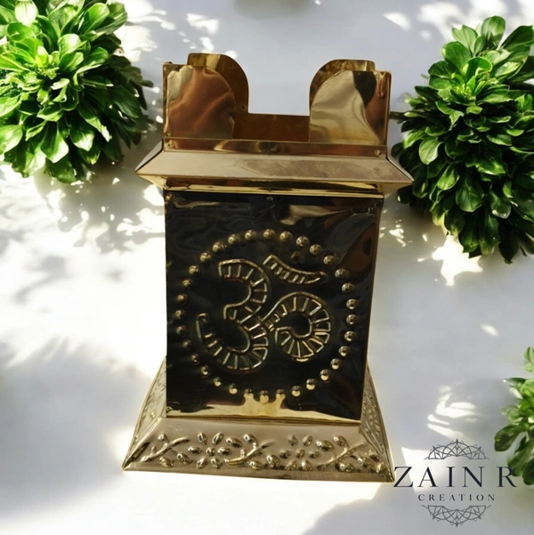 Sold By ZAIN R CREATION A Brass Tulsi Pot, also known as a Tulsi Kyara or Tulsi Maadam - H.7.5'' L.4'' B.5.5'', Brass