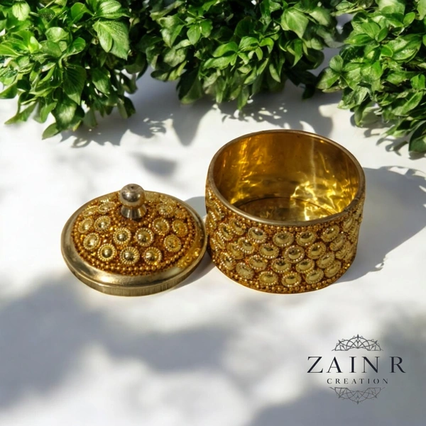 Sold By ZAIN R CREATION A Sindoor or Kumkum pot is a traditional container used to store sacred red powder - H.2'' B.2'', Brass