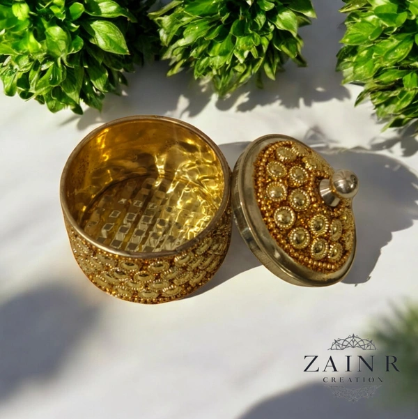 Sold By ZAIN R CREATION A Sindoor or Kumkum pot is a traditional container used to store sacred red powder - H.2'' B.2'', Brass