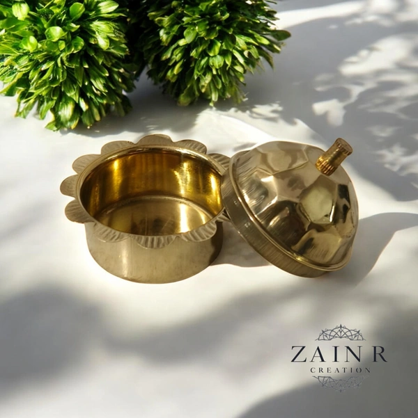 Sold By ZAIN R CREATION A Sindoor or Kumkum pot is a traditional container used to store sacred red powder - H.2'' B.2'', Brass