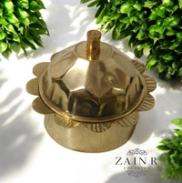 Sold By ZAIN R CREATION A Sindoor or Kumkum pot is a traditional container used to store sacred red powder - H.2'' B.2'', Brass