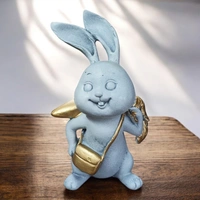 Sold By ZAIN R CREATION Rabbit With Carrot Showpiece for Home Decor - H.7'' L.4'' B.3''