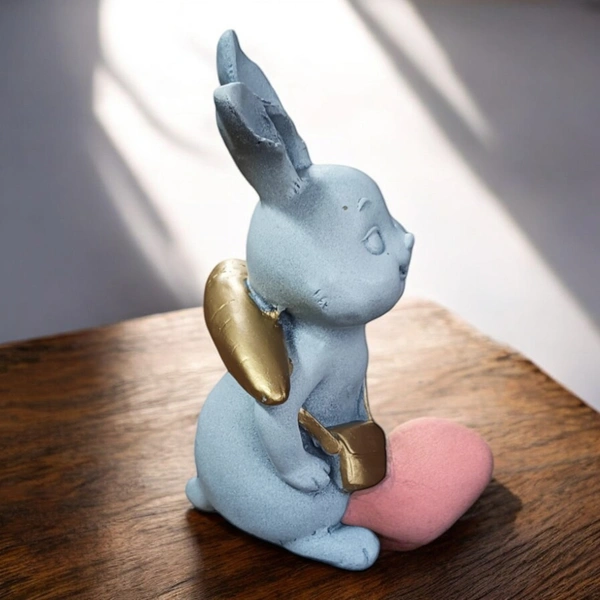 Sold By ZAIN R CREATION Rabbit With Carrot Showpiece for Home Decor - H.7'' L.4'' B.3''