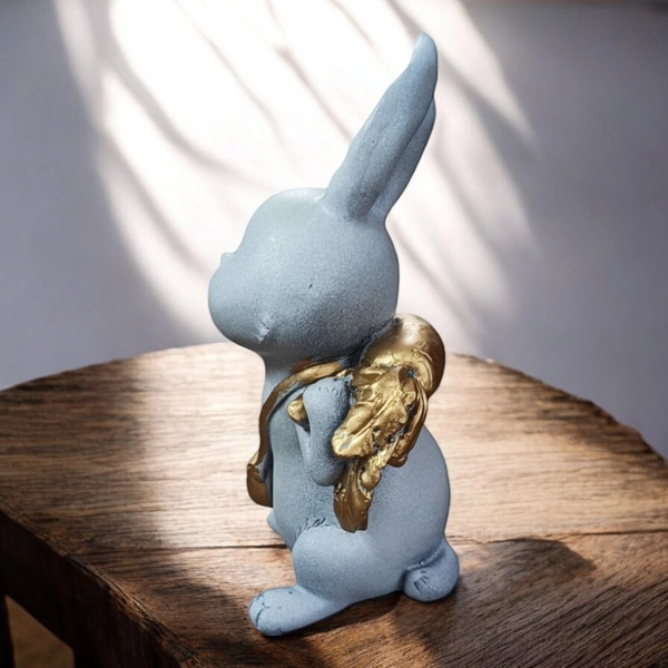 Sold By ZAIN R CREATION Rabbit With Carrot Showpiece for Home Decor - H.7'' L.4'' B.3''