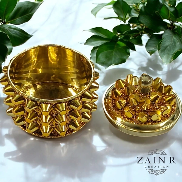 Sold By ZAIN HOME DECOR A Sindoor or Kumkum pot is a traditional container used to store sacred red powder - H.2'' B.2'', Brass