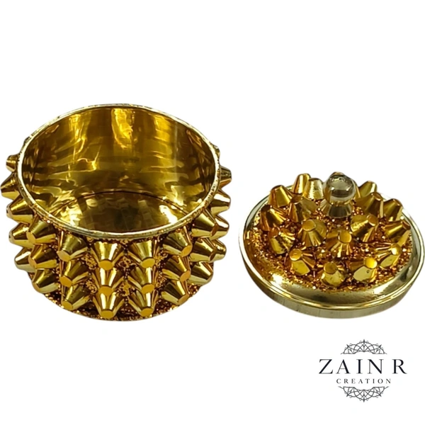 Sold By ZAIN HOME DECOR A Sindoor or Kumkum pot is a traditional container used to store sacred red powder - H.2'' B.2'', Brass
