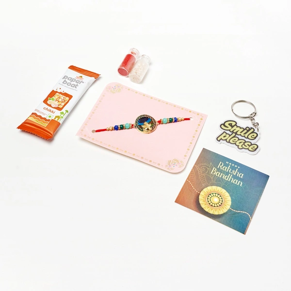 Beautiful Mor Ganesha Rakhi for Brother with Sweet Gift Hamper | Raksha Bandhan Gift Box with Designer Rakhi, Sweets & Greeting Card | Gifts for Bhai