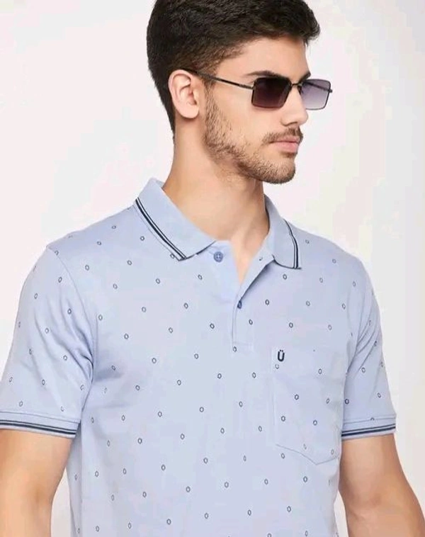 UNIBERRY Men's Cotton Half Sleeves Printed Polo Neck T-shirtName: UNIBERRY Men's Cotton Half Sleeves Printed Polo Neck T-shirtFabric: Cotton BlendSleeve Length: Short SleevesPattern: PrintedNet Quantity (N): 1Sizes:M (Chest Size: 40 in, Length Size: 27 in) L (Chest Size: 42 in, Length Size: 28 in) XL (Chest Size: 44 in, Length Size: 29 in) XXL (Chest Size: 46 in, Length Size: 30 in - M