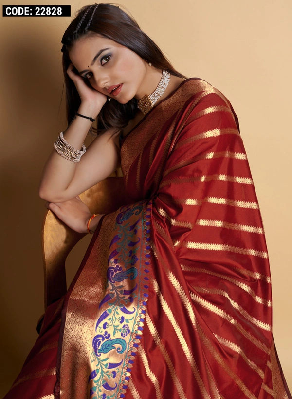 FabricKanchipuram silkBlouseKanchipuram silkSaree Length5.5 Mtr.Blouse Length0.8 Mtr.WorkZari weaving workCare instructionDry clean only