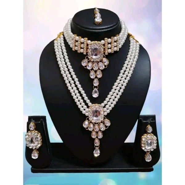 The Stunning Rock combo necklace set with earrings and maang tika